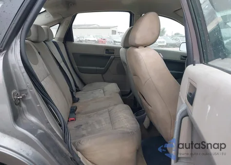 2009 Ford Focus Se из США, поврежденный, VIN 1FAHP35N39W153587